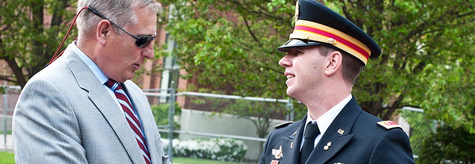 Student and Veteran shaking hands