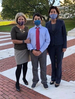 Justine Currie and her son with Rhode Island Governor Gina Raimondo